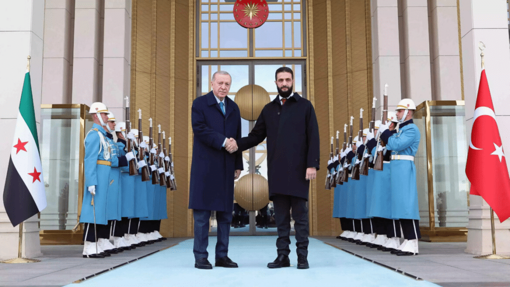 Il Presidente turco Recep Tayyip Erdoğan ed il suo omologo siriano Al-Jolani.