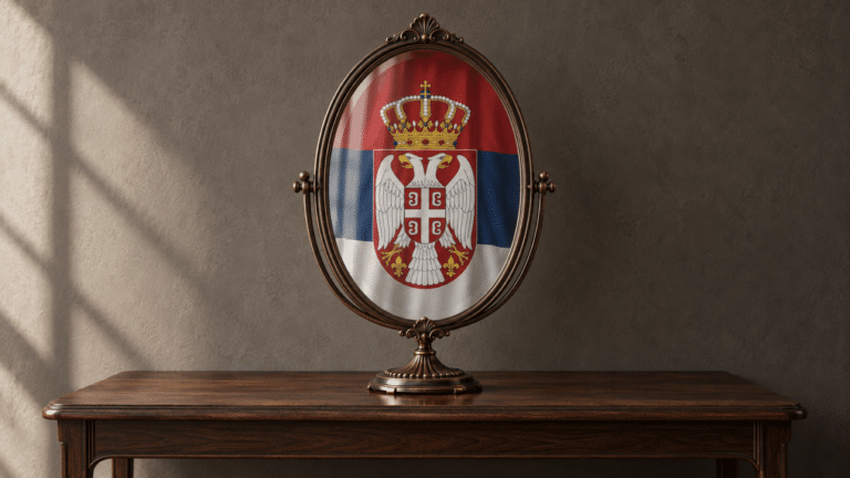 Specchio ovale con lo stemma e il tricolore della Serbia su una consolle in legno
